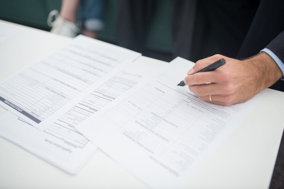 business contract signing process with legal documentation