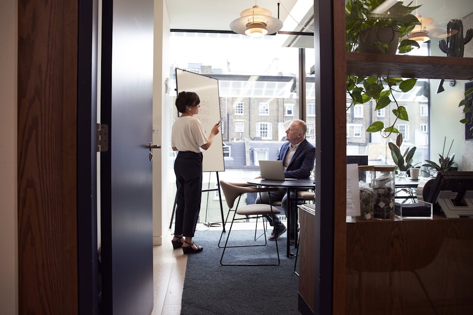 corporate executives discussing business strategy in modern boardroom